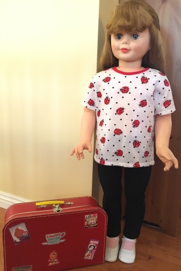 doll and suitcase